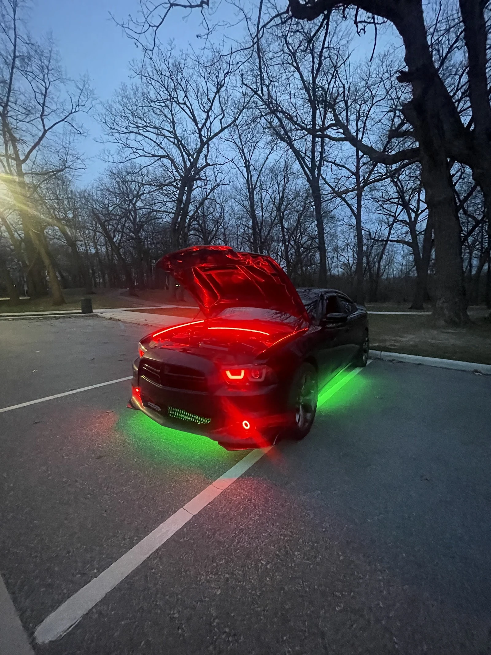 Custom car with window tint and LED underglow by Level Solutions 574 in Goshen, IN